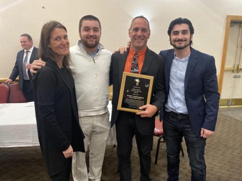 In November, 2022 Wayland High School football coach Scott Parseghian and David Gavron received coaching awards for their hard work over their seasons at Wayland. From left to right: Trish Regan, Dante Parseghian, Scott Parseghian and Damien Parseghian stand after S. Parsegian received the ANEFO Mark Crehan Coach of the Year Award. “It was about acknowledging our team, but also acknowledging our coaching staff,” S. Parseghian said. “It’s not just about myself because you can’t do this on your own.”