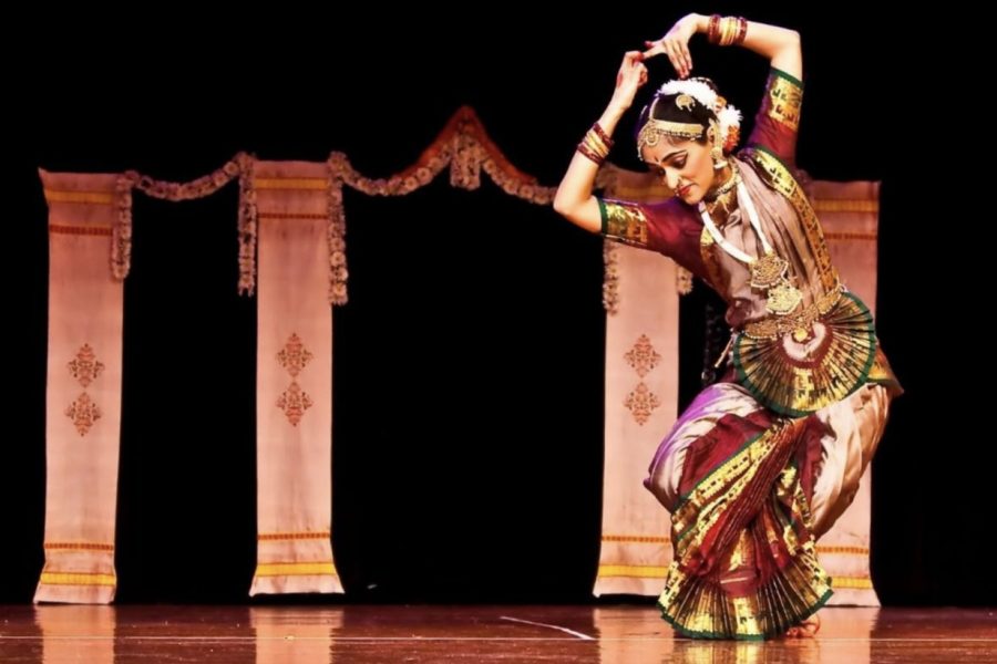 Dancer+and+teacher+Pallavi+Nagesha+dances+across+the+stage.+As+Nagesha+teaches+other+and+continues+to+grow+herself%2C+she+hopes+to+expand+the+connection+she+has+with+Bharatnatyam.+%E2%80%9CDance+is+a+very+personal+experience%2C+so+each+of+the+dancers+has+to+get+from+it+what+they+want%2C+and+I+think+the+mind-body-soul+connection+is+what+I+crave+and+I+work+towards%2C%E2%80%9D+Nagesha+says.+