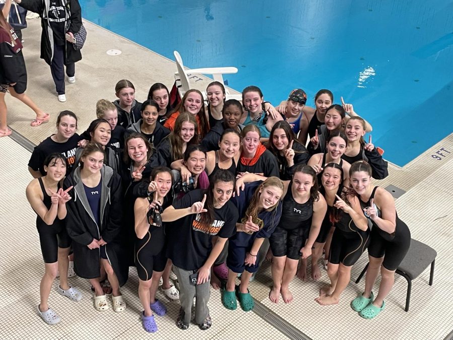 The Wayland girls swim team poses after winning the Dual County League Championship on Sunday, Feb. 5. Girls swim ended the season with an undefeated record.