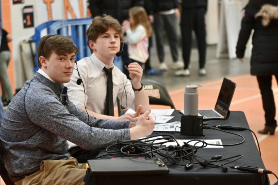 Sophomores+Owen+Finnegan+and+Luke+DiPietro-Froio+commentate+a+girls+varsity+basketball+game.+The+class+uses+state+of+the+art+equipment+to+make+the+sports+broadcasts+as+clear+as+possible.
