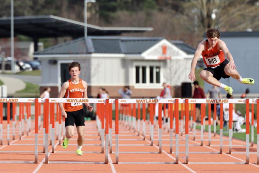 Sophomore Luke DiPietrio-Froio and junior Ben Wright participate in the boys 110 meter hurdles. Wright got second, and Dipietrio-Froio placed third. Both ran in the 400 meter hurdle race as well. My favorite thing about racing is probably just trying to get the best time I can, Wright said.