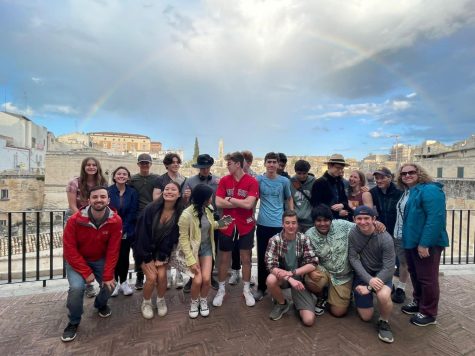 WHS Latin students pose for a picture in front of a fence in Matera, Italy. There were a lot of funny stories and fond memories from the trip, but if I were to share just one, it would be the time when we arrived in Matera, junior Harrison Dale said. As it had just finished raining, there was a rainbow in the sky, which arched right above the old city from one of the viewing points in a very picturesque scene.