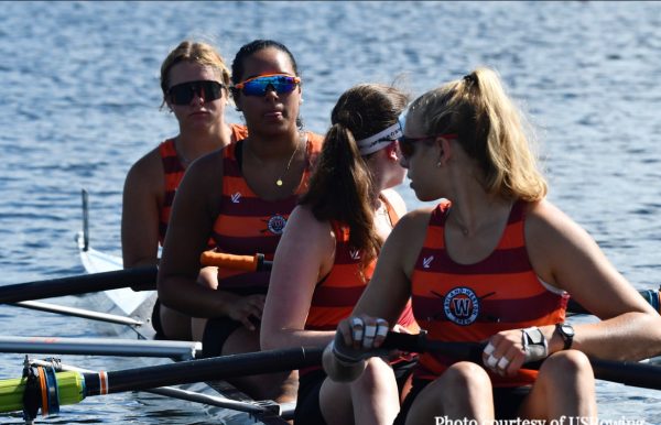 Senior Ava Balukonis checks over her shoulder to check that her boat is on the right course. Balukonis raced the womens straight four at Nationals in Sarasota, Florida. 
