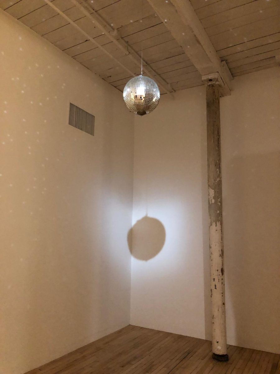 A disco ball hangs from the ceiling at an exhibit in the Massachusetts Museum of Contemporary Art. Mass MoCA is one of several art museums in the state that is open year round.