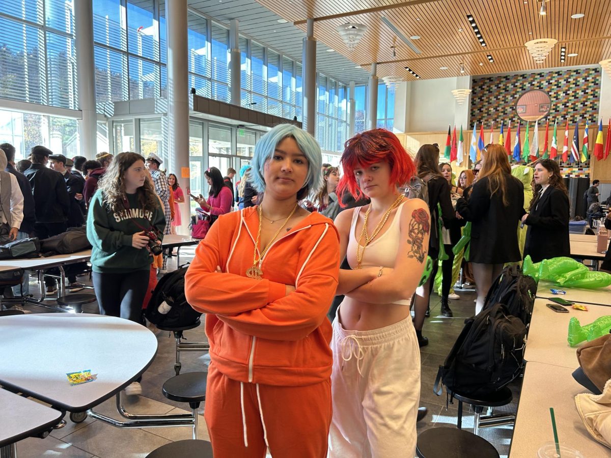 Seniors Anjali Tandon and Cicily Langdon dress up as Pete Davidson and Timothée Chalamets rap characters from their Saturday Night Live skit.
