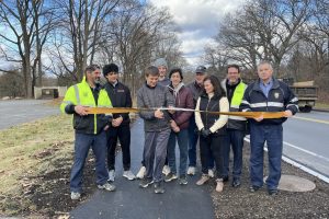 Paving the way for change: WHS juniors implement new sidewalk in Wayland