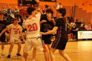 Boys basketball eeks out a win over Weston on senior night