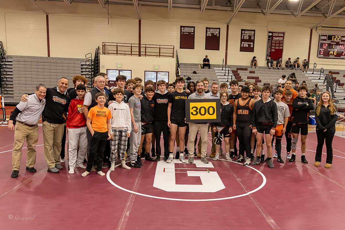 WSPNs Edge Wheeler and Ben Jackson spotlight WHS wrestling coach Sean Chase and his 300 wrestling wins as a coach.