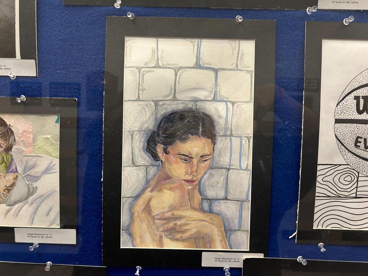 Outside the art classrooms, senior Abby Wrentmore’s drawing is displayed. Wrentmore is attending Smith College next year.

Scavenger hunt prompt: a photo something a student created.
