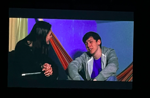 An image captured from the short film called “This Girl Named Lucy” is shown in the WHS theater. This movie portrays a tragic love story between two friends.