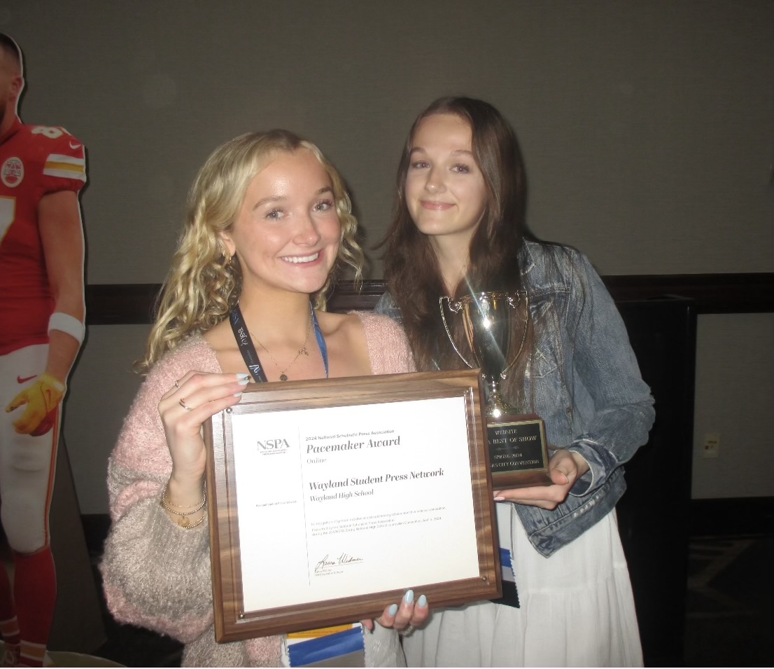 Co-editors-in-chief Talia Macchi and Nadya Chase share a smile with WSPNs Pacemaker and Best of Show award.