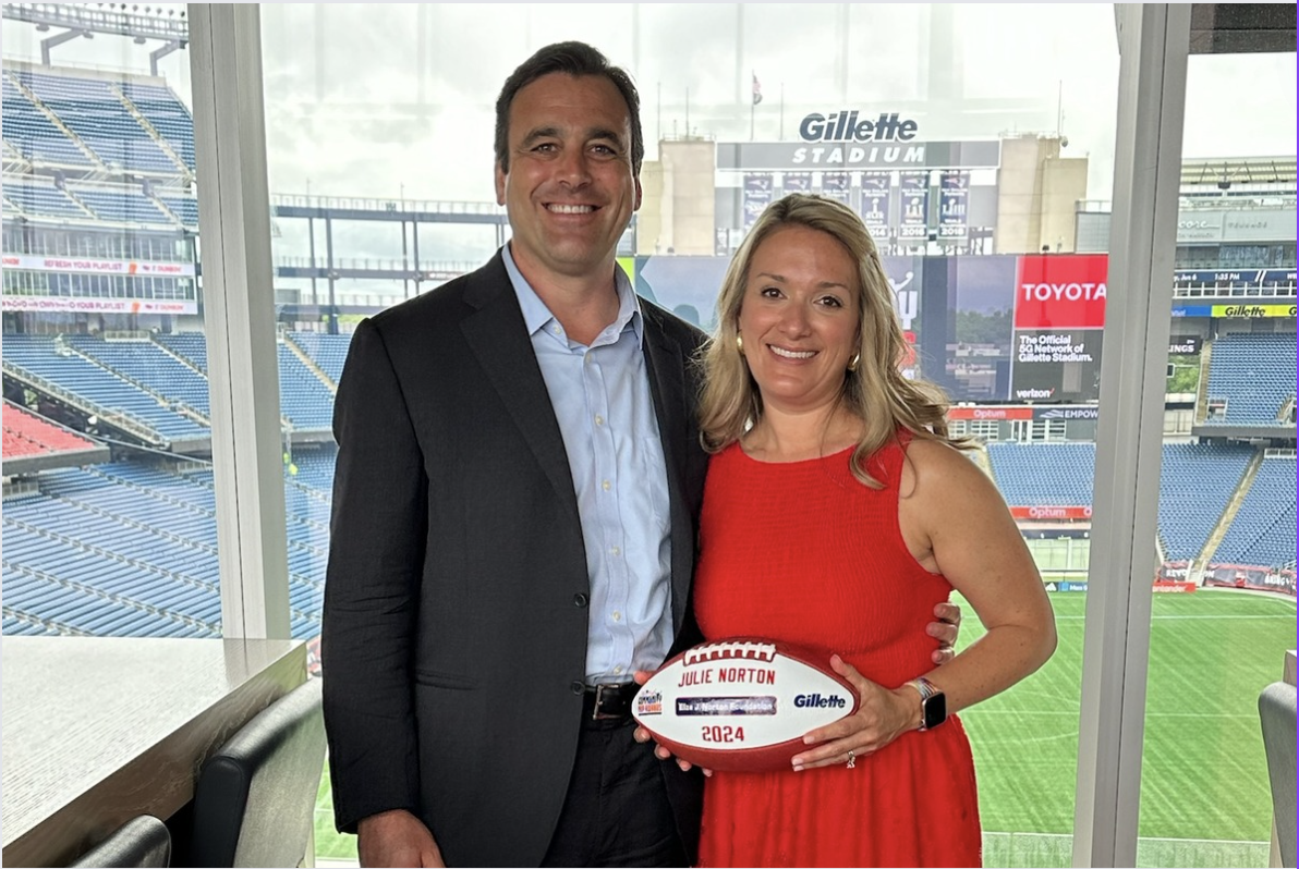 Co-founders of the Eliza J. Norton Foundation (EJNF ) Julie and Mark Norton celebrate at Gillette Stadium for being recognized as Myra Kraft Community MVP award winners.