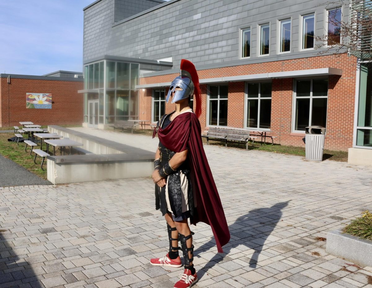 A gladiator stares up and into the distance. Senior Enious Taggart chose this ancient attire because of his interest in Roman armor.