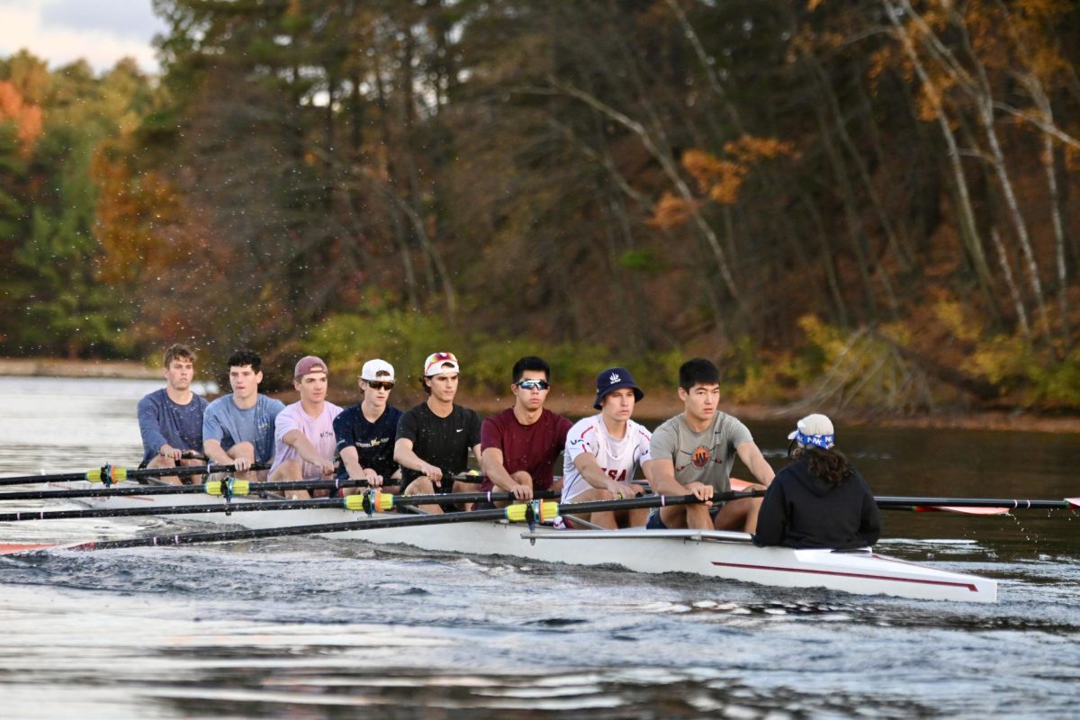 The rowers in the boys first varsity eight boat finish their last set of the workout before cooling down. In the fall, crew races are typically five kilometers long, while in the spring, races are two kilometers long.