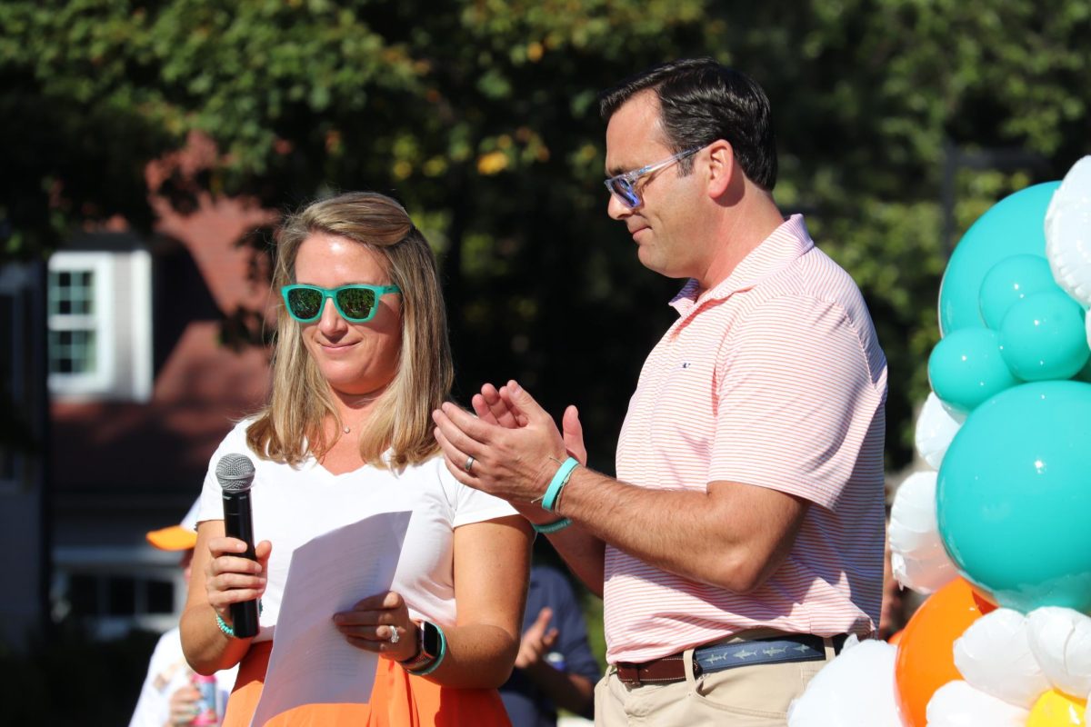 Parents of Eliza J. Norton each deliver a speech while the celebration continues.