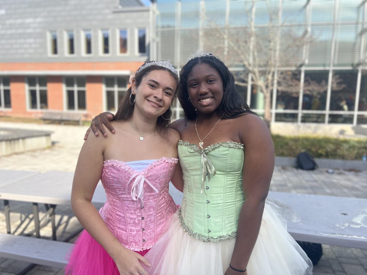 Seniors Marisa Soto and Kiarra Shouder smile and display their duo-costume: Princess Tiana and Lottie from the Disney's "Princess and the Frog." "I've been waiting for this since freshman year," Shouder said.