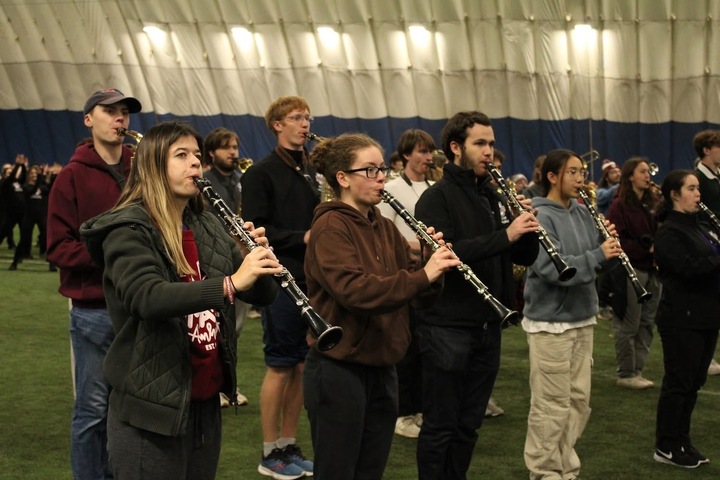 WHS alum Thomas Creavin practices the clarinet alongside his bandmates the Monday before Macy's annual Thanksgiving Parade. Creavin is part of the University of Massachusetts Amherst Marching Band.