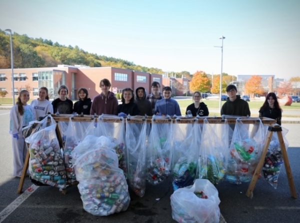 Senior Sofia Simmons poses on the left along with volunteers for a bottle drive to raise awareness for climate change. Simmons advocates for the climate through Green Team, National Honors Society and National Arts Honors Society.