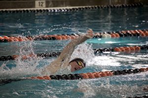 The swim and dive team splashes into a successful quad meet