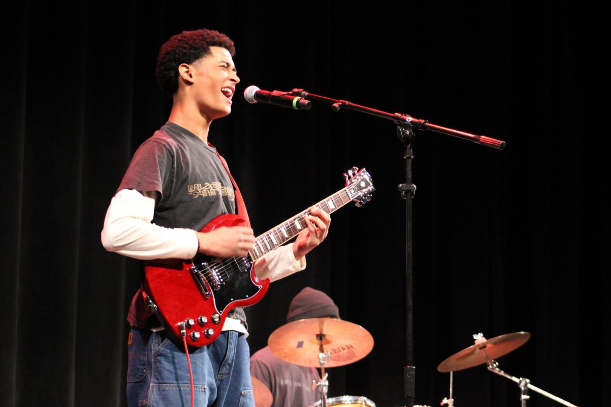 Junior Ben Hammond, the guitarist of Vagabond, belts the lyrics to "Brazil" by Declan McKenna, while playing the melody on his electric guitar. "My favorite song was 'Brazil' because I absolutely love that song," junior Vanessa Ponce said. "I think Ben sung it perfectly and it was so fun to sing along to."