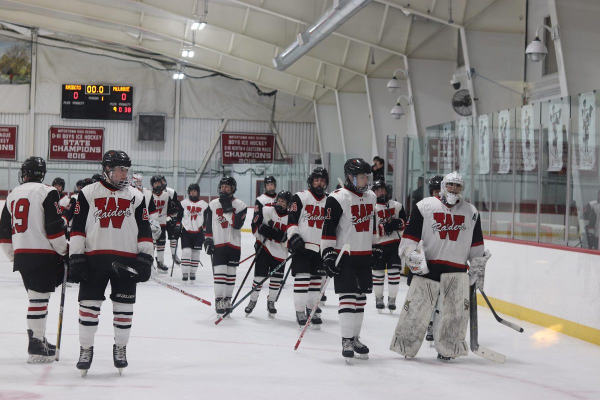 During halftime, the team skates off the ice and heads to the locker room. While both teams took their breaks, they also had pep talks for their game plans. "The team played hard, we just couldn't get pucks past such a talented goalie," senior Graham Henrich said.