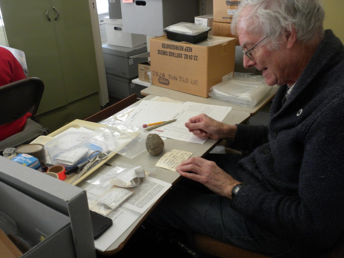 Volunteer Rick Conards copies facts from artifacts for them to upload into a database meant for archaeological research. Conards is a volunteer in the archaeology department. 