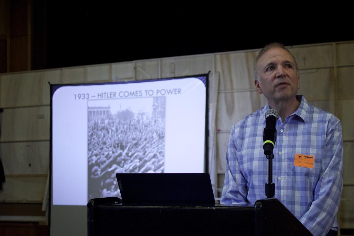 Dan Ottenheimer walks the students through the story of his family's journey throughout Germany. Ottenheimer has visited to Wayland High every year to teach 9th and 11th graders about his families experience during the holocaust.