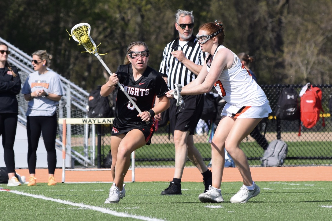 Senior Zoe Roi defends against a North Andover player.