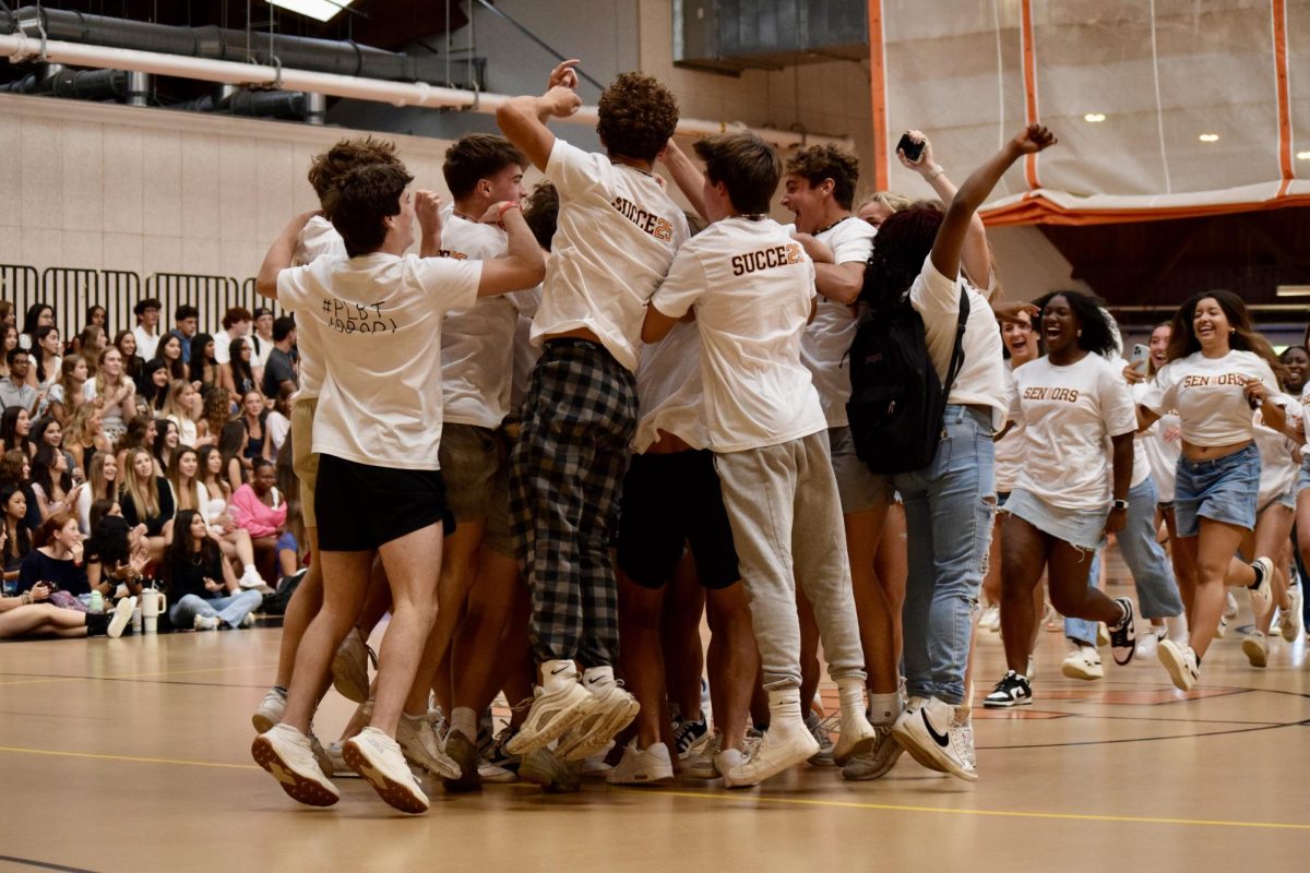 Seniors run into the field house on their first day of high school to the song “Welcome To The Jungle” by Guns N’ Roses.