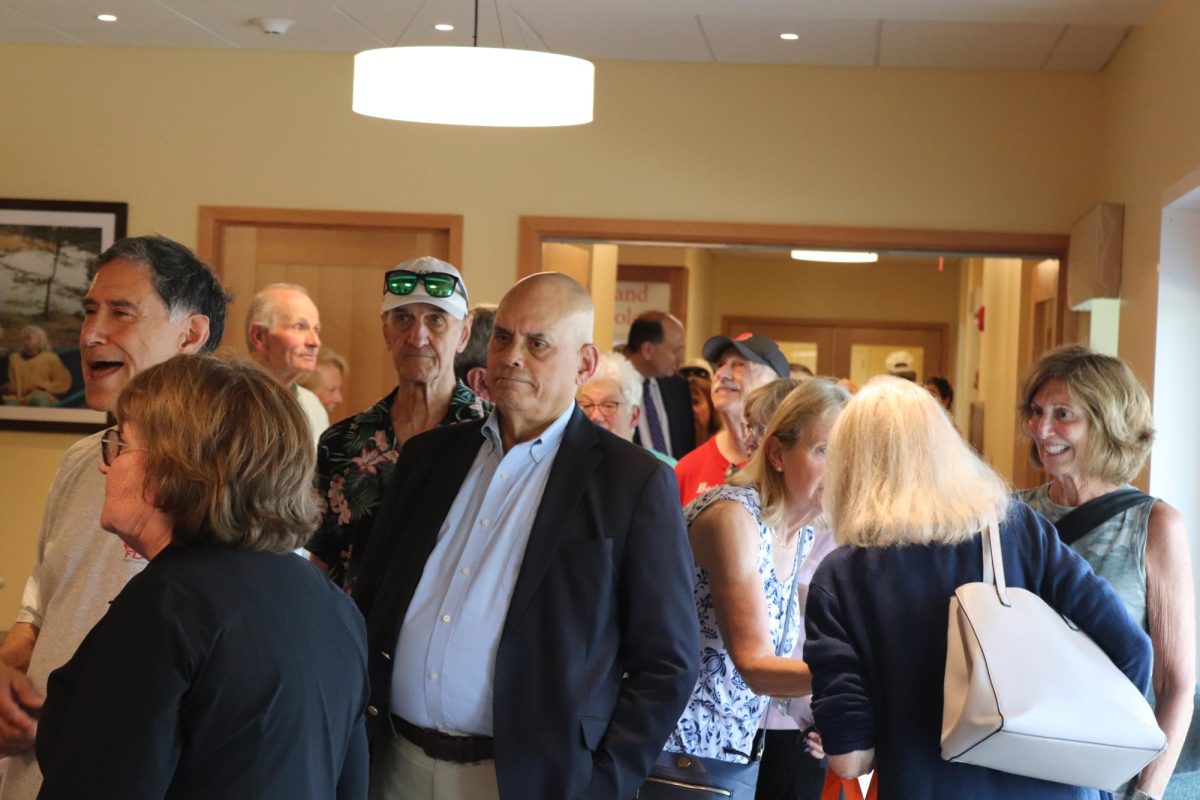 Wayland residents gather in the front room of the new community center just minutes after the doors offically opened.