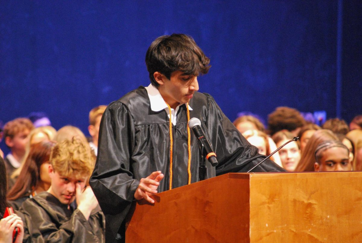 Class of 2025 Senior President Armaan Chaudhry welcomes guests into the auditorium with a speech. "We are quite literally celebrating our achievements together over the past 4 years," Chaudhry said. 
