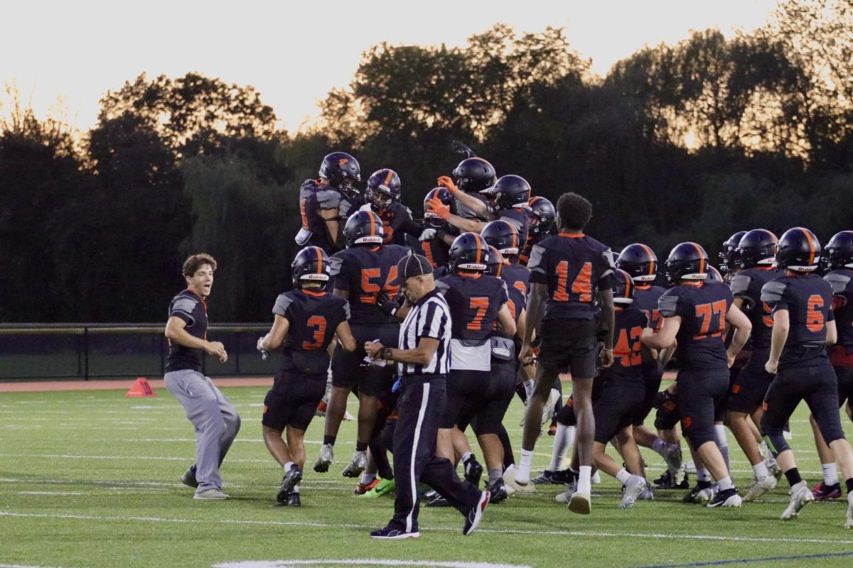 After the captains, seniors Dylan Engelhardt, Alex Evengelista and juniors Brajae Walton Aidan Curry come back from meeting with the reffs and Ashlands captains, players rush the field and jump up in excitement. "Our team is young, but shows a lot of potential," Engelhardt said. "At the end of the day, it comes down to getting better each week and reducing mistakes."
