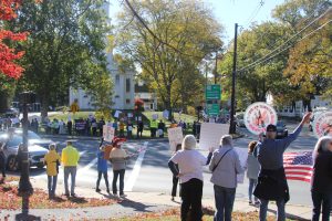 Protesters gather in Wayland as a part of the worldwide No Kings protest