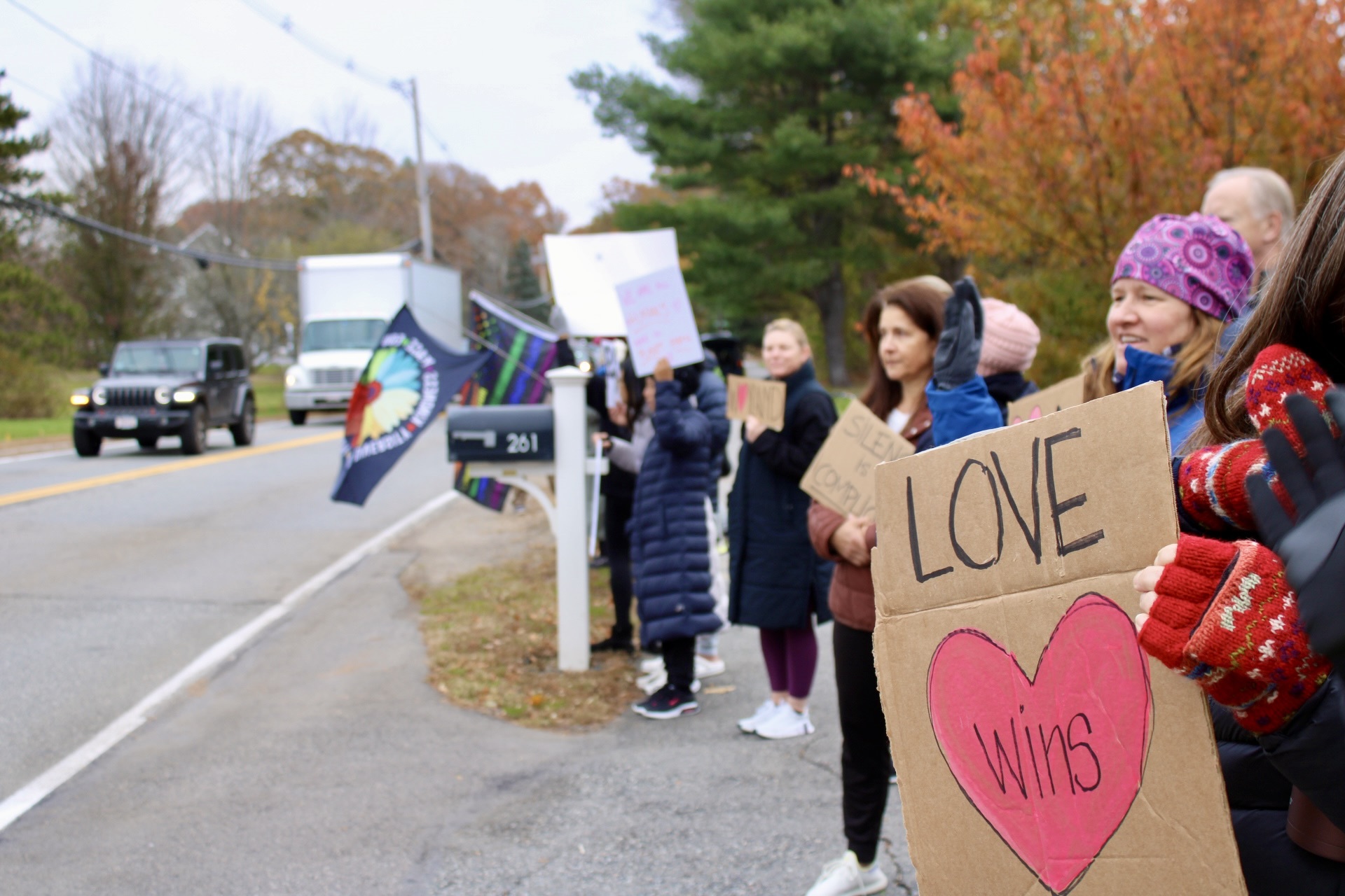Community members gather at the intersection to WHS. This rally was organized by the Wayland CAN in response to the racist incident that occurred in the boys locker room.