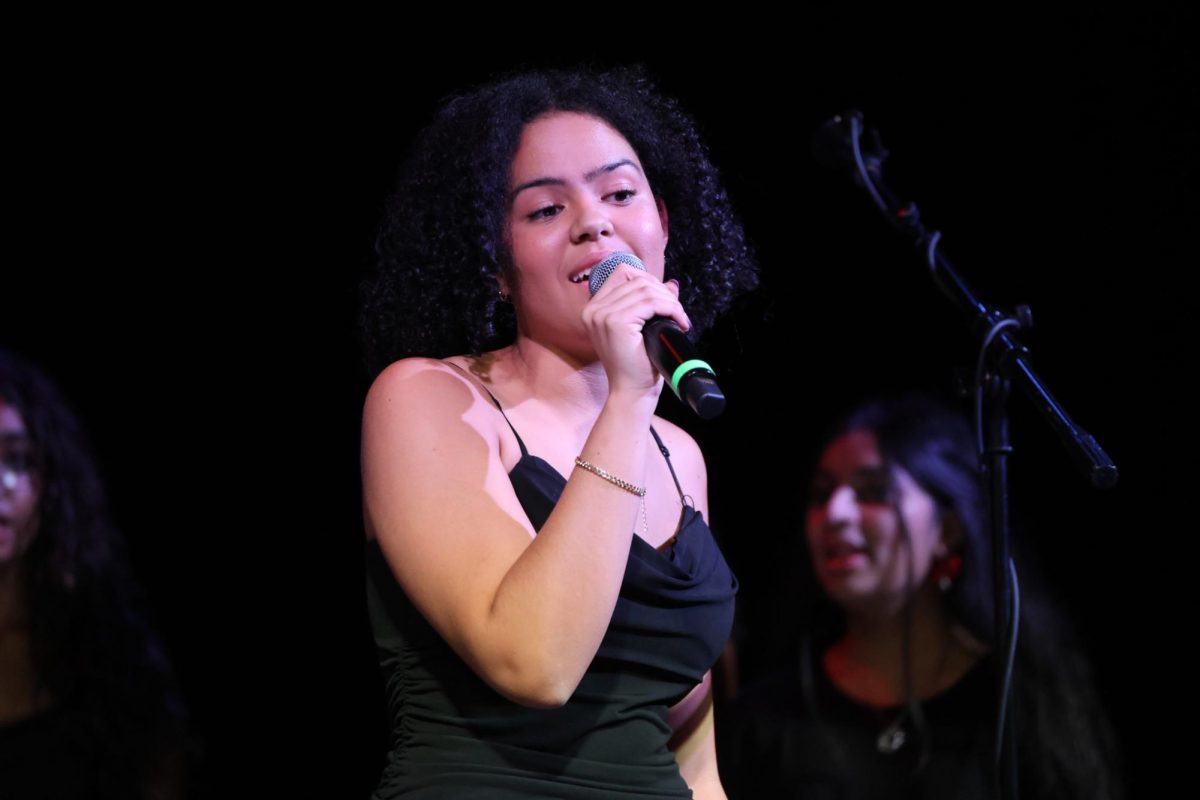Junior muses director Maggie Agyeman sings a mashup of Fleetwood Mac songs as their second song during their part of the concert. 