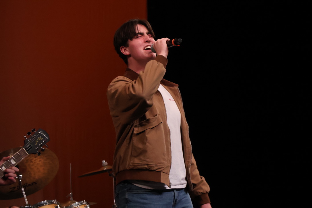Sophomore John Brevard sings the lyrics to the song 'Where is my mind' by the Pixies. Brevard performed this song with his band, the Eastbay Band. The band hosted a bennefit concert last spring alongside Vagabond and others.