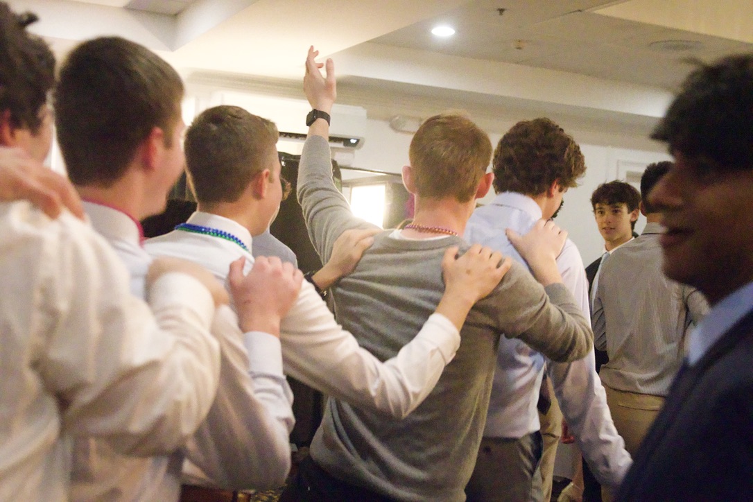A group of sophomores starts a conga line, traveling around the venue. As the song went on, the conga line grew.