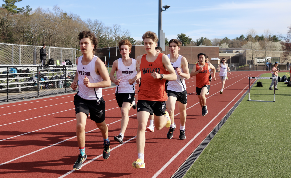 Running the 800 meter race, junior Owen Chislett leads the pack of runners. Chislett recorded his season best time with a 2:15.03.