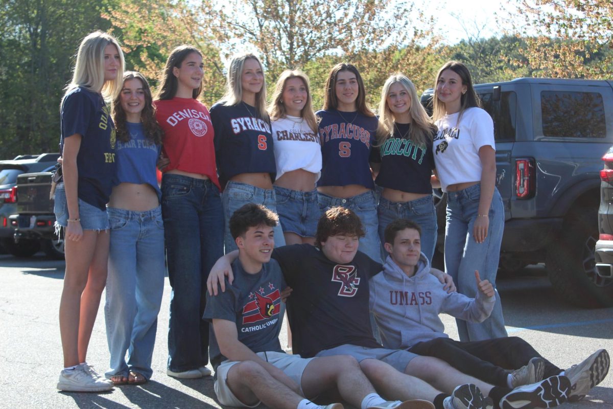 Seniors Caroline Rent, Danica Doyle, Riley O'Driscoll, Ava Knourenko, Molly Bergeron, Eliza Russell, Abby Peredna, Anna Yalli, Jayden Newland, Jack Doyle and Connor Langan (left to right) pose for a photo. This group of seniors are all in the same english class.