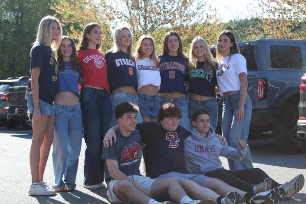 Seniors Caroline Rent, Danica Doyle, Riley O'Driscoll, Ava Knourenko, Molly Bergeron, Eliza Russell, Abby Peredna, Anna Yalli, Jayden Newland, Jack Doyle and Connor Langan (left to right) pose for a photo. This group of seniors are all in the same english class.