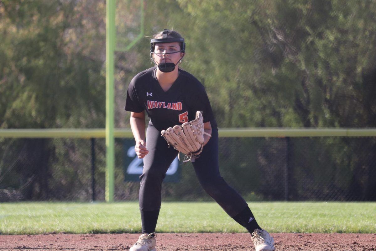 Sophomore Kaitlyn DiJulia gets low to receive the ball. She is Wayland’s starting third baseman and has been since her freshman year.