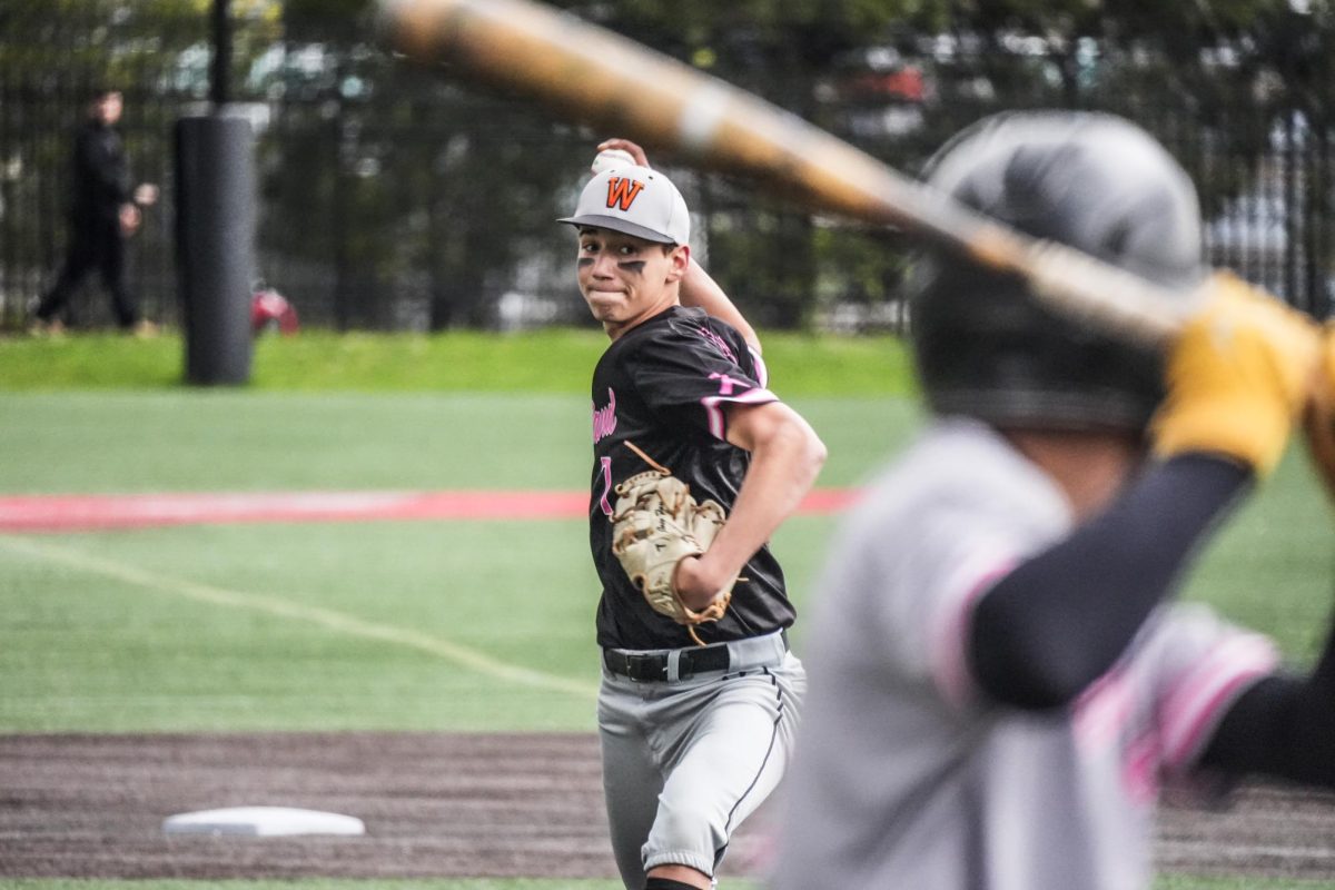 Junior captain Joey Fay pitches the ball. "I'm proud of how we played and hopefully we can send a message to the rest of the DCL that we can compete with everyone," Fay said.