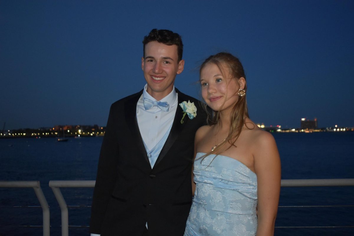 Juniors Joey Fay and Fiona Peltonen smile together.