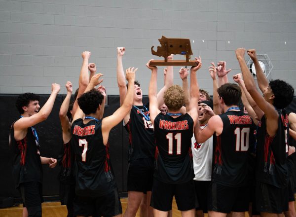 The team celebrates after winning the game 3-1.