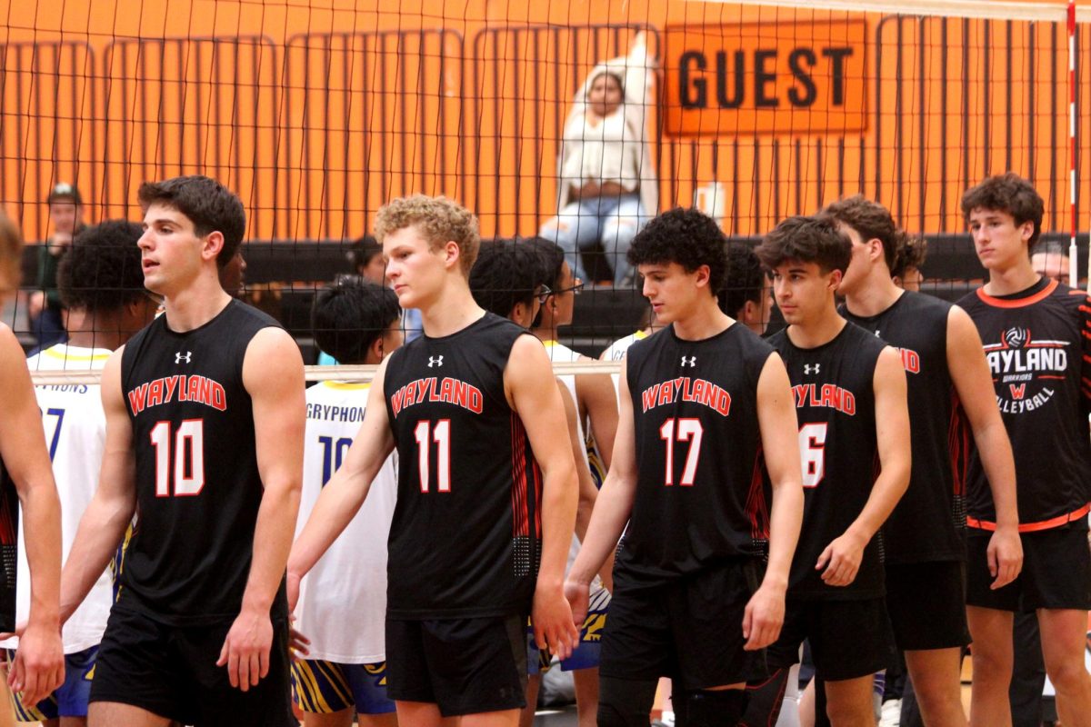 Players shake hands after Wayland won the game 3-0.