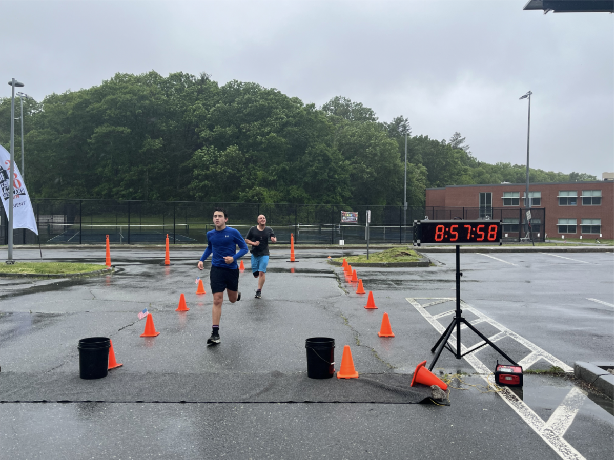 Freshman Jonathan Yates finishes the race, winning for the 13-18 age group
